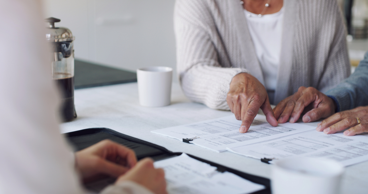 couple looking over last will and testament