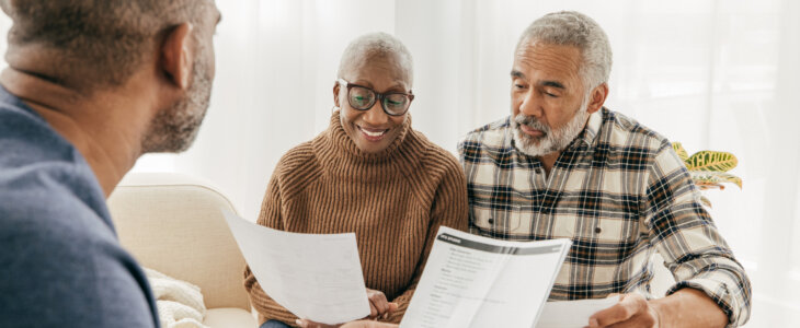 Close up of a senior couple getting help from an estate lawyer