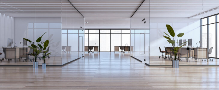 Clean white glass office and meeting room interior with wooden parquet flooring