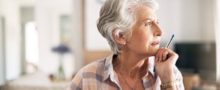 senior woman looking thoughtful