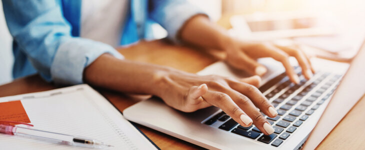 Person doing DIY estate planning on their laptop