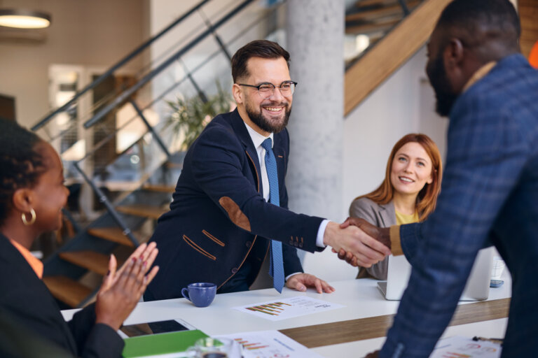 Business partners shaking hands