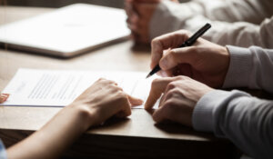 agreement at meeting to make financial business deal, bank loan service, close up view